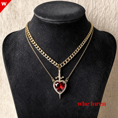 collar para parejas , corazon y daga.